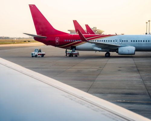 planes on runway in modern airport of China.